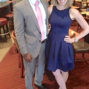 Banana Republic navy fit and flare dress with black trim and stitching on bust